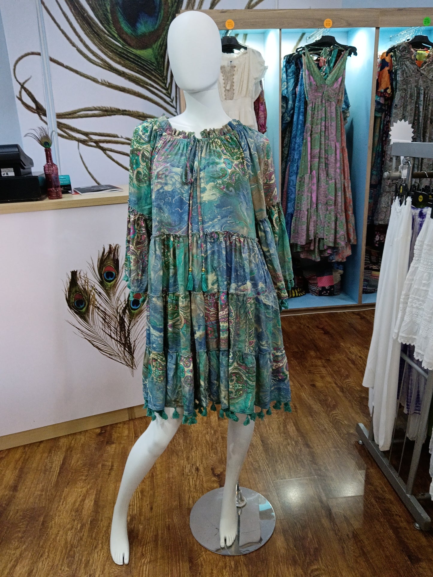 Knee length dress with tassels